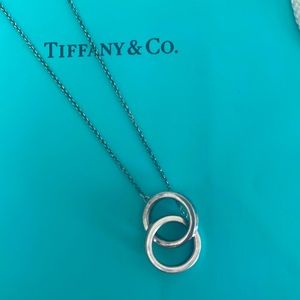 Tiffany sterling small interlock pendant 16 inch